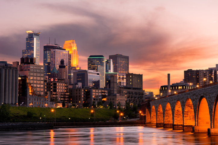 Minneapolis Minnesota Downtown and the Stone Arch Bridge at Sunset